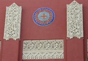 closeup of carving and Indian design on high school fa&ccedil;ade