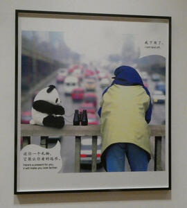 Man and toy panda with binoculars on bridge; panda says “Here’s a present for you, it will make you lok farther. Man says “I am laid off.”