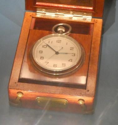 Pocket watch in wooden case