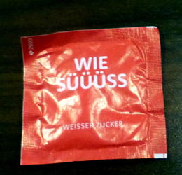 How Sweeeet; small print is “White Sugar” Sugar packet reading “How Sweeeet”