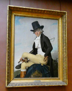 Man in top hat, riding boots, with riding crop