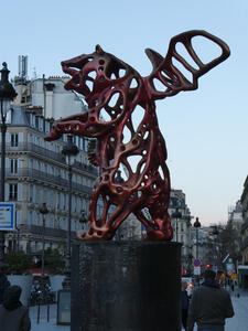 Bronze sculpture that looks like a bear with wings