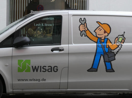 Cartoon handyman holding wrench