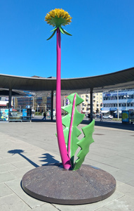 Large statue of dandelion at main train station