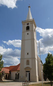 Brown and white church with white steeple