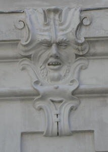 Bearded man with eyes half closed