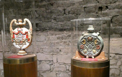 Two ornate round medallions (?)
