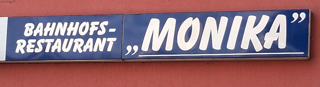 Restaurant with quotes left-facing lower quote and left-facing upper closing quote