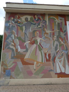 Art deco style wall painting of two women dancing. In background, a small band of musicians with a conductor.