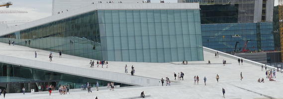 Opera house, white concrete ramps, glass window exterior