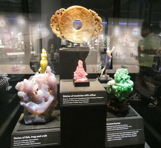 Sculpture of fish in chalecdony, musician in beryl, incense burner in jade