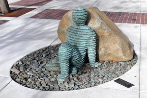 Ginnetoy 2nd (Boaz Vaadia) Bluestone and bronze sculpture of a reclining man