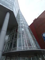 conical glass attachment to building conical glass attachment to building