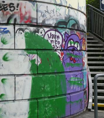 Purple cat saying “have a nice day”