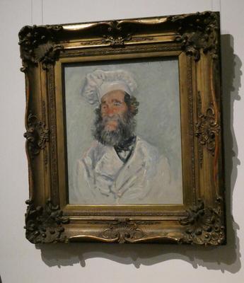 Painting of a chef with a bushy beard. he is wearing a white coat and a toque.