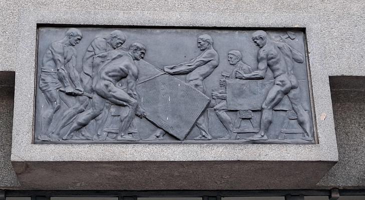 Relief of workers carrying large rectangular stones
