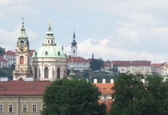 Three churches; center one has green dome.