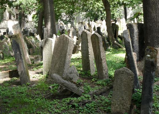 Headstones tilted at various angles.
