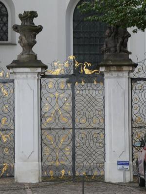 Wrought iron fence with gold leaf decoration