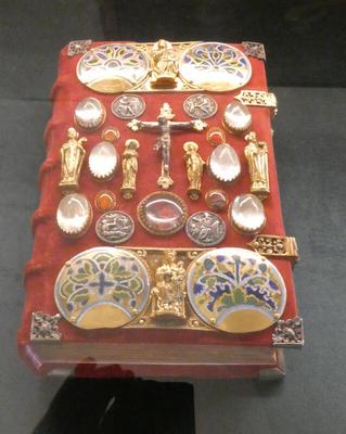 Book cover decorated with a cross and religious iconography