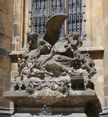 Statuary of angel holding body of Christ.