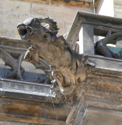 Fish-shaped gargoyle attached to building