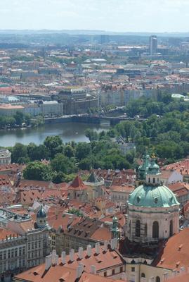 View from top of tower. The river and a bridge are in center of photo.