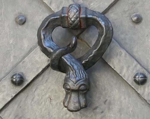 Serpent-shaped door knocker.