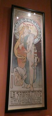 Poster for “La Samaritaine” with drawing of Sarah Bernhardt. She is in a robe and has long flowing blonde hair.